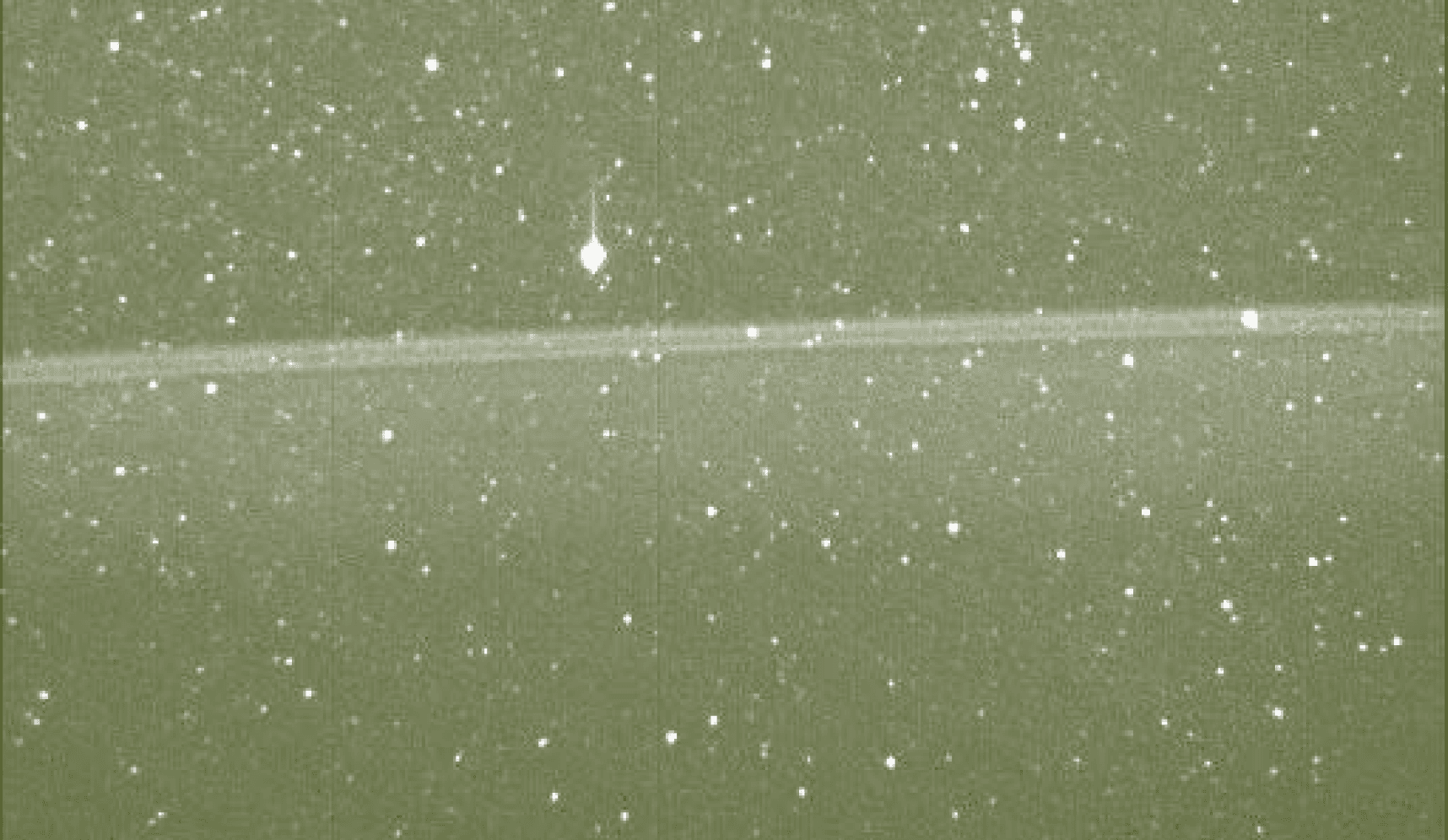 An image of space with lots of stars and a green overlay